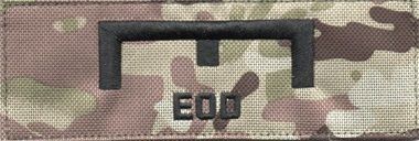 Bæres af EOD (Explosive Ordnance Disposal) personel.